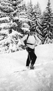 Hemingway on skis in 1927, public domain